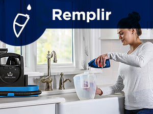 Retirer le réservoir d'eau propre et verser la solution de nettoyage jusqu'à la ligne, puis ajouter de l'eau chaude du robinet jusqu'au repère. 