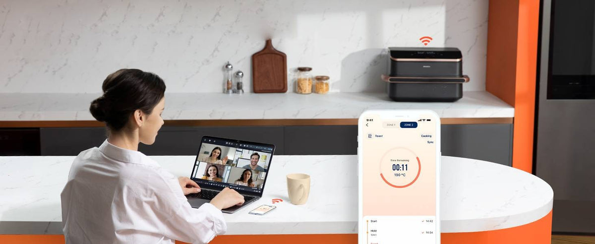 Suivi de la cuisson à distance avec l'application VeSync pendant que la Cosori TwinFry cuisine