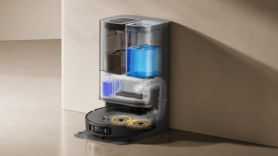 Intérieur de la station PowerDock™ : réservoirs, sac à poussière et lavage des serpillières à l'eau chaude